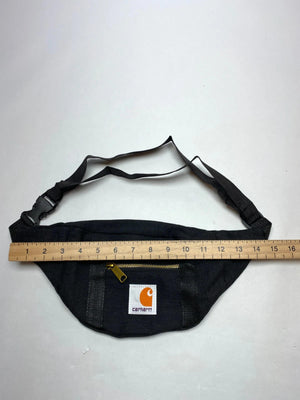 Black with gold-tone zippers and Carhartt logo patch