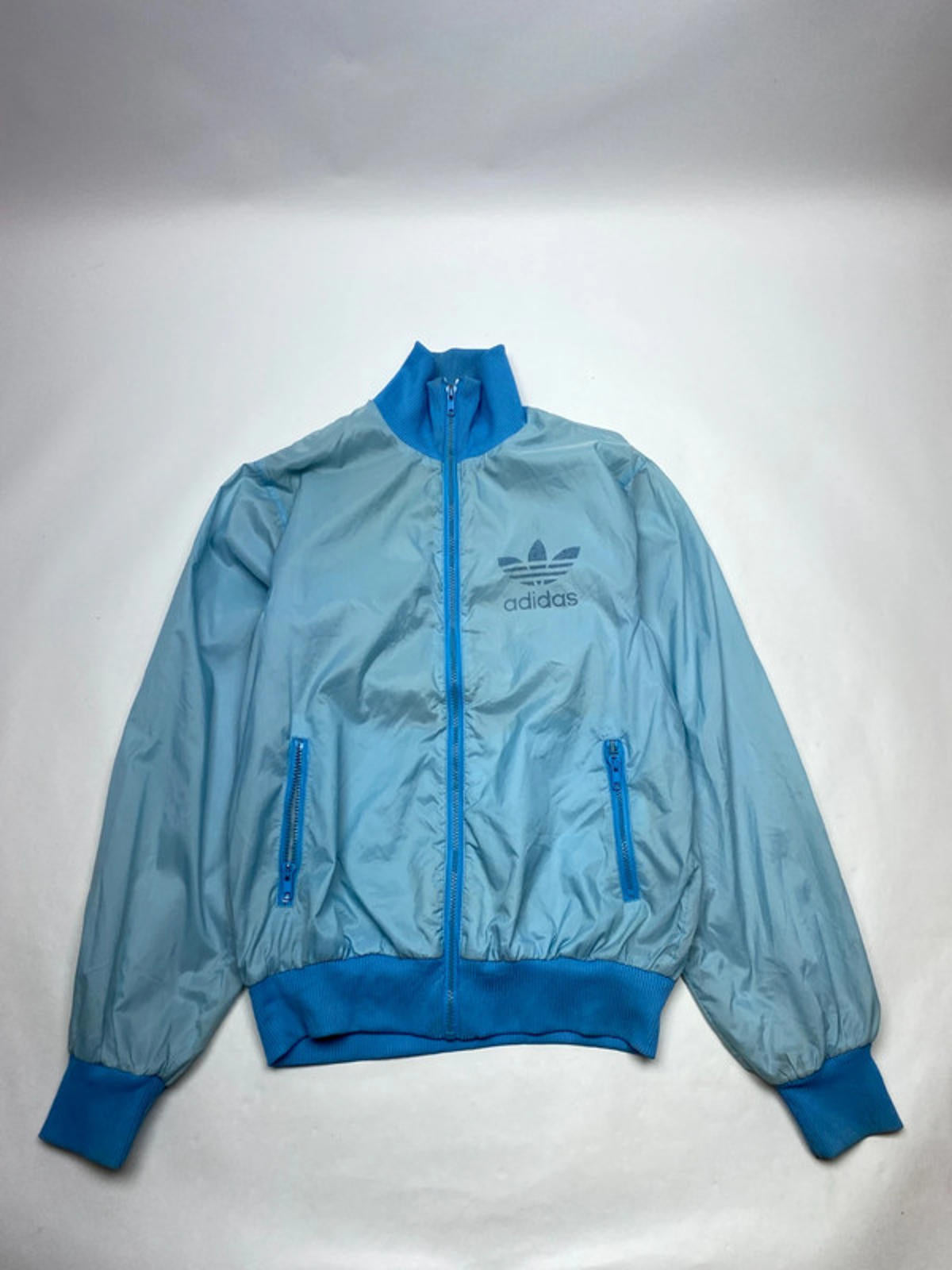 Vintage Adidas Originals Light Blue Windbreaker Jacket
